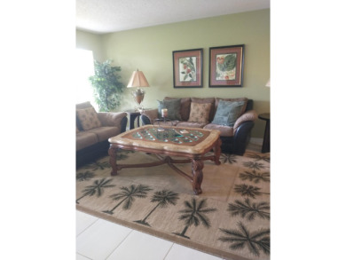 Beautiful, immaculate first floor corner unit, large open on Indian Spring Golf and Country Club in Florida - for sale on GolfHomes.com, golf home, golf lot