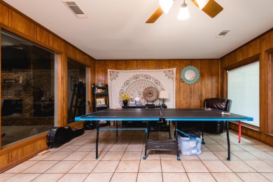 This mid-century, single-level home sits on a spacious half acre on Maumelle Golf and Country Club in Arkansas - for sale on GolfHomes.com, golf home, golf lot