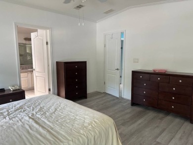 ENJOY PEACEFUL WATERFRONT LIVING IN THIS BRIGHT AND SPACIOUS on Schalamar Creek Golf and Country Club in Florida - for sale on GolfHomes.com, golf home, golf lot