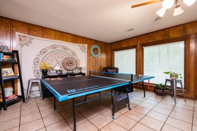 This mid-century, single-level home sits on a spacious half acre on Maumelle Golf and Country Club in Arkansas - for sale on GolfHomes.com, golf home, golf lot
