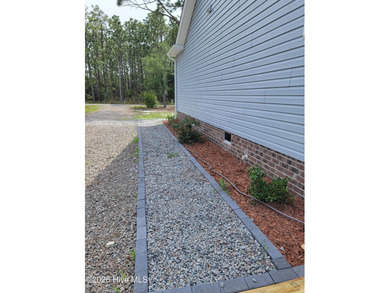 Custom home on huge lot with NO HOA and water view of Paradise on The Lakes Country Club in North Carolina - for sale on GolfHomes.com, golf home, golf lot