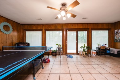 This mid-century, single-level home sits on a spacious half acre on Maumelle Golf and Country Club in Arkansas - for sale on GolfHomes.com, golf home, golf lot