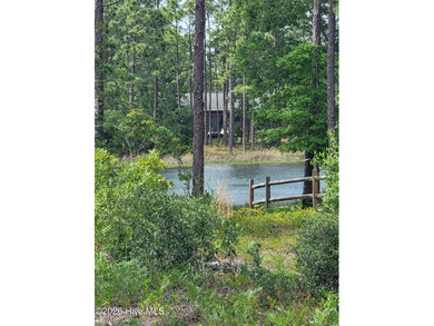 Custom home on huge lot with NO HOA and water view of Paradise on The Lakes Country Club in North Carolina - for sale on GolfHomes.com, golf home, golf lot