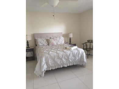 Beautiful, immaculate first floor corner unit, large open on Indian Spring Golf and Country Club in Florida - for sale on GolfHomes.com, golf home, golf lot