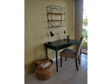Beautiful, immaculate first floor corner unit, large open on Indian Spring Golf and Country Club in Florida - for sale on GolfHomes.com, golf home, golf lot