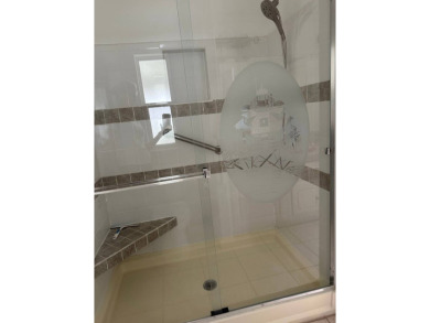 ENJOY PEACEFUL WATERFRONT LIVING IN THIS BRIGHT AND SPACIOUS on Schalamar Creek Golf and Country Club in Florida - for sale on GolfHomes.com, golf home, golf lot