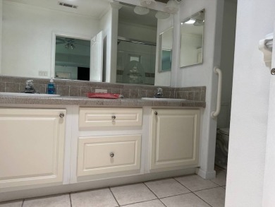 ENJOY PEACEFUL WATERFRONT LIVING IN THIS BRIGHT AND SPACIOUS on Schalamar Creek Golf and Country Club in Florida - for sale on GolfHomes.com, golf home, golf lot