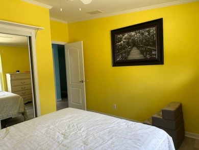 ENJOY PEACEFUL WATERFRONT LIVING IN THIS BRIGHT AND SPACIOUS on Schalamar Creek Golf and Country Club in Florida - for sale on GolfHomes.com, golf home, golf lot