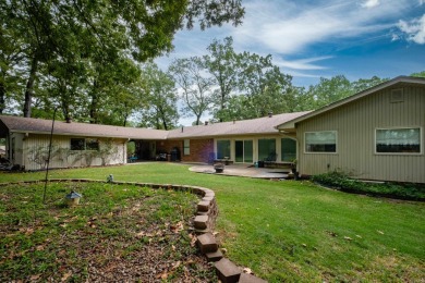 This mid-century, single-level home sits on a spacious half acre on Maumelle Golf and Country Club in Arkansas - for sale on GolfHomes.com, golf home, golf lot