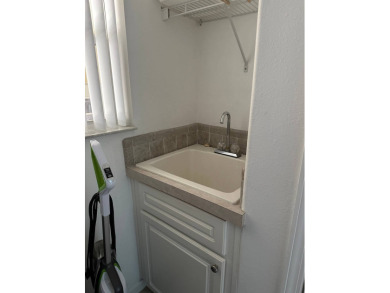 ENJOY PEACEFUL WATERFRONT LIVING IN THIS BRIGHT AND SPACIOUS on Schalamar Creek Golf and Country Club in Florida - for sale on GolfHomes.com, golf home, golf lot