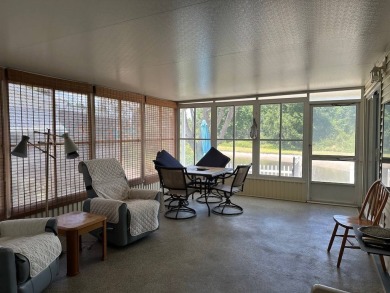 ENJOY PEACEFUL WATERFRONT LIVING IN THIS BRIGHT AND SPACIOUS on Schalamar Creek Golf and Country Club in Florida - for sale on GolfHomes.com, golf home, golf lot