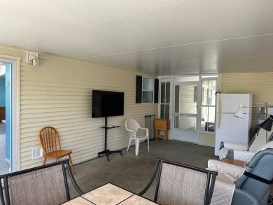 ENJOY PEACEFUL WATERFRONT LIVING IN THIS BRIGHT AND SPACIOUS on Schalamar Creek Golf and Country Club in Florida - for sale on GolfHomes.com, golf home, golf lot