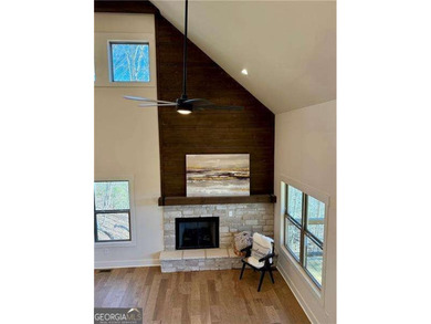 Welcome to this custom-built modern craftsman cabin nestled on White Path Golf Club in Georgia - for sale on GolfHomes.com, golf home, golf lot