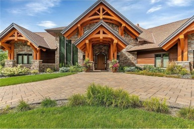 Enjoy the epitome of luxury living on the 16th hole at the St on St. Cloud Country Club in Minnesota - for sale on GolfHomes.com, golf home, golf lot