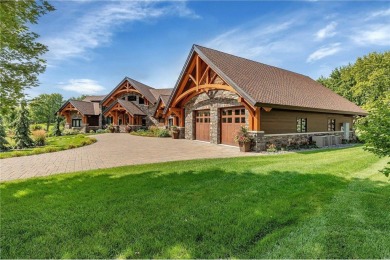 Enjoy the epitome of luxury living on the 16th hole at the St on St. Cloud Country Club in Minnesota - for sale on GolfHomes.com, golf home, golf lot