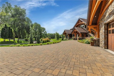 Enjoy the epitome of luxury living on the 16th hole at the St on St. Cloud Country Club in Minnesota - for sale on GolfHomes.com, golf home, golf lot