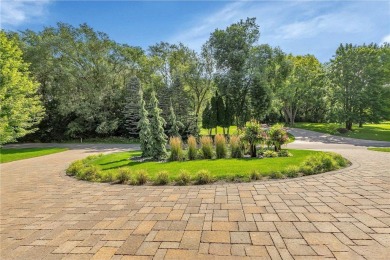 Enjoy the epitome of luxury living on the 16th hole at the St on St. Cloud Country Club in Minnesota - for sale on GolfHomes.com, golf home, golf lot