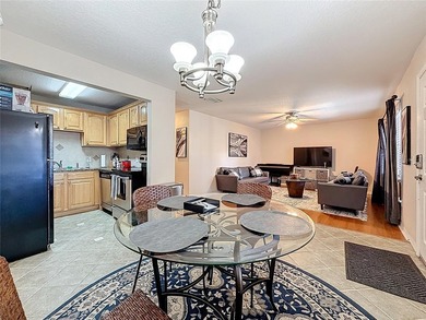 Welcome to this bright and spacious 2-bedroom, 2-bath on Pasadena Yacht and Country Club in Florida - for sale on GolfHomes.com, golf home, golf lot