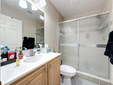 Welcome to this bright and spacious 2-bedroom, 2-bath on Pasadena Yacht and Country Club in Florida - for sale on GolfHomes.com, golf home, golf lot