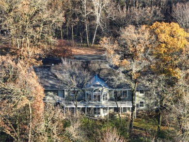 Timeless elegance abounds in this custom-built home nestled on 2 on Chippewa Valley Golf Club in Wisconsin - for sale on GolfHomes.com, golf home, golf lot