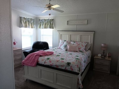 This Beautiful, well maintained home is located with views of on Four Lakes Golf Club in Florida - for sale on GolfHomes.com, golf home, golf lot