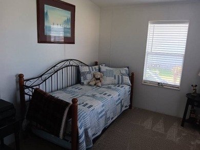 This Beautiful, well maintained home is located with views of on Four Lakes Golf Club in Florida - for sale on GolfHomes.com, golf home, golf lot