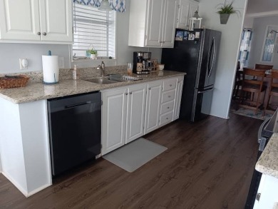 This Beautiful, well maintained home is located with views of on Four Lakes Golf Club in Florida - for sale on GolfHomes.com, golf home, golf lot