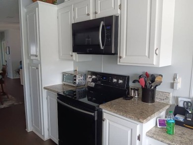 This Beautiful, well maintained home is located with views of on Four Lakes Golf Club in Florida - for sale on GolfHomes.com, golf home, golf lot