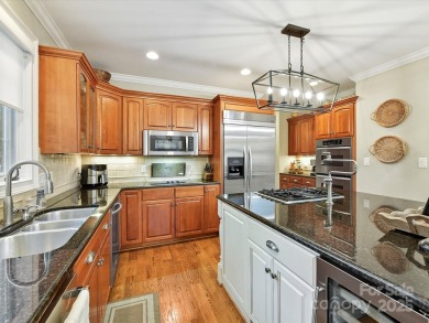 This stunning brick home is loaded with luxury features and on Emerald Lake Golf Club in North Carolina - for sale on GolfHomes.com, golf home, golf lot