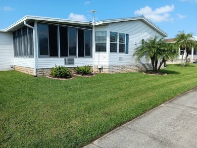 This Beautiful, well maintained home is located with views of on Four Lakes Golf Club in Florida - for sale on GolfHomes.com, golf home, golf lot