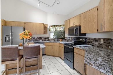 This 3 bedroom, 2 bath, 2 garage home in Oakleaf Villas has on Sugarmill Woods Golf and Country Club in Florida - for sale on GolfHomes.com, golf home, golf lot
