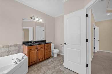 Welcome home to this well-maintained home nestled within the on Meadowlands Golf Club in North Carolina - for sale on GolfHomes.com, golf home, golf lot