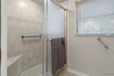This 3 bedroom, 2 bath, 2 garage home in Oakleaf Villas has on Sugarmill Woods Golf and Country Club in Florida - for sale on GolfHomes.com, golf home, golf lot