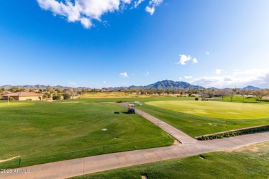 Situated on a. corner lot across from the 13th hole of Seville on Seville Golf and Country Club in Arizona - for sale on GolfHomes.com, golf home, golf lot