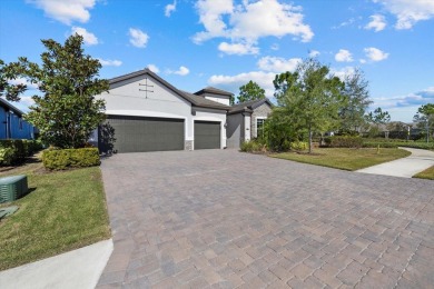 Stunning Summerville Model in Arbor Grande - Resort-Style Living on Esplanade Golf and Country at Lakewood Ranch in Florida - for sale on GolfHomes.com, golf home, golf lot