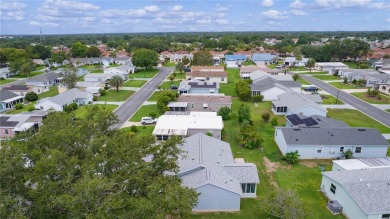 Welcome to this VALUE-PRIDCED, NO BOND, clean and inviting on El Diablo Executive Golf Course in Florida - for sale on GolfHomes.com, golf home, golf lot