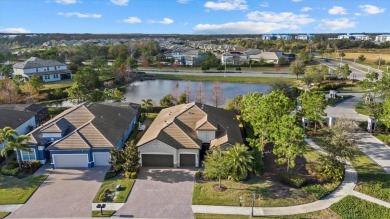 Stunning Summerville Model in Arbor Grande - Resort-Style Living on Esplanade Golf and Country at Lakewood Ranch in Florida - for sale on GolfHomes.com, golf home, golf lot