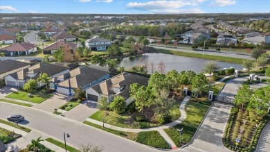 Stunning Summerville Model in Arbor Grande - Resort-Style Living on Esplanade Golf and Country at Lakewood Ranch in Florida - for sale on GolfHomes.com, golf home, golf lot