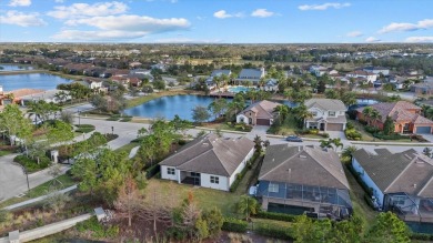 Stunning Summerville Model in Arbor Grande - Resort-Style Living on Esplanade Golf and Country at Lakewood Ranch in Florida - for sale on GolfHomes.com, golf home, golf lot