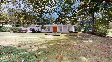 Welcome to this stunning Mid-Century home, a rare find in Yester on Spring Hill College Golf Course in Alabama - for sale on GolfHomes.com, golf home, golf lot