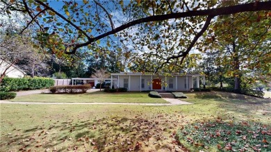 Welcome to this stunning Mid-Century home, a rare find in Yester on Spring Hill College Golf Course in Alabama - for sale on GolfHomes.com, golf home, golf lot