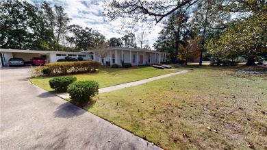 Welcome to this stunning Mid-Century home, a rare find in Yester on Spring Hill College Golf Course in Alabama - for sale on GolfHomes.com, golf home, golf lot