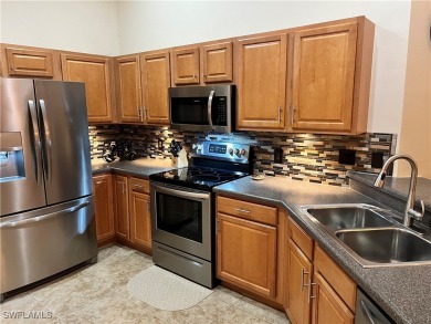 PRICE REDUCED-MOVE IN READY!!!ENJOY THE SUNRISE while sipping on Colonial Country Club in Florida - for sale on GolfHomes.com, golf home, golf lot
