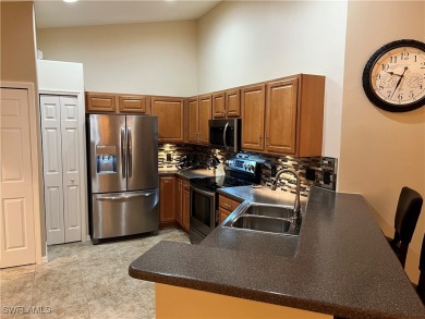 PRICE REDUCED-MOVE IN READY!!!ENJOY THE SUNRISE while sipping on Colonial Country Club in Florida - for sale on GolfHomes.com, golf home, golf lot