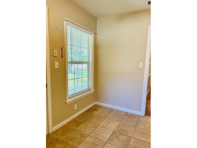 Nestled on a large lot in a well-kept neighborhood, this on Phillips Country Club in Texas - for sale on GolfHomes.com, golf home, golf lot
