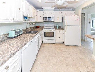 $15,000 PRICE REDUCTION!  TOP FLOOR CONDO in ELEVATOR, PET on Martin County Golf Course in Florida - for sale on GolfHomes.com, golf home, golf lot