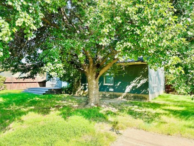 Nestled on a large lot in a well-kept neighborhood, this on Phillips Country Club in Texas - for sale on GolfHomes.com, golf home, golf lot