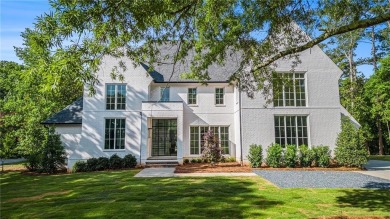 Set on a sprawling 1-acre lot in an established, tree-lined on Dunwoody Country Club in Georgia - for sale on GolfHomes.com, golf home, golf lot
