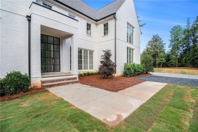 Set on a sprawling 1-acre lot in an established, tree-lined on Dunwoody Country Club in Georgia - for sale on GolfHomes.com, golf home, golf lot