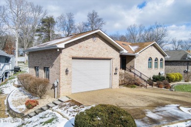 This distinguished all brick home sits on the 11th green of the on Druid Hills Golf Club in Tennessee - for sale on GolfHomes.com, golf home, golf lot